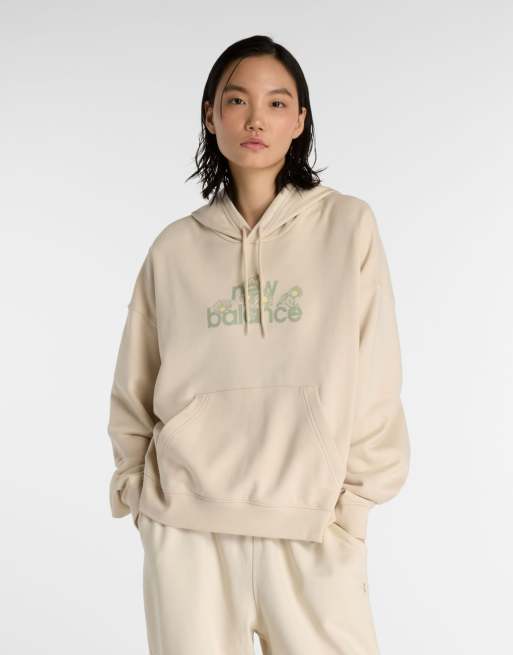 New Balance - Felpa con cappuccio colore bisque con fiori
