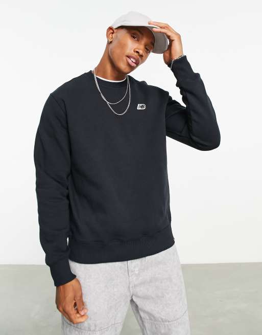 New Balance - Felpa nera con logo piccolo