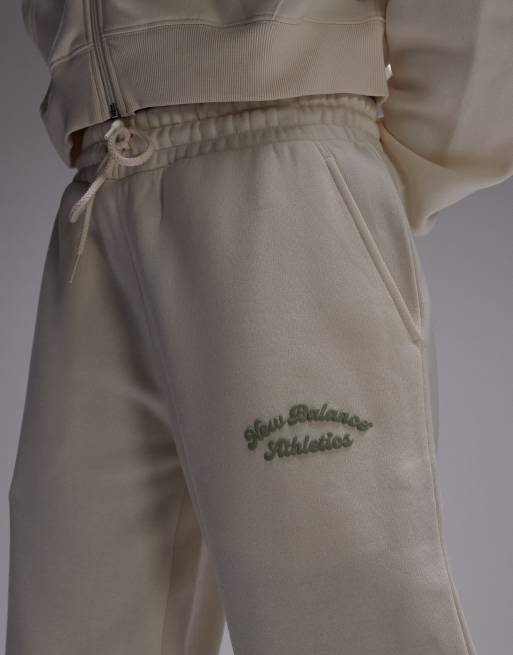 New Balance fleece wide leg trackies in beige ASOS