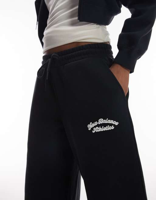 New Balance fleece wide leg trackies in black, 3 of 5