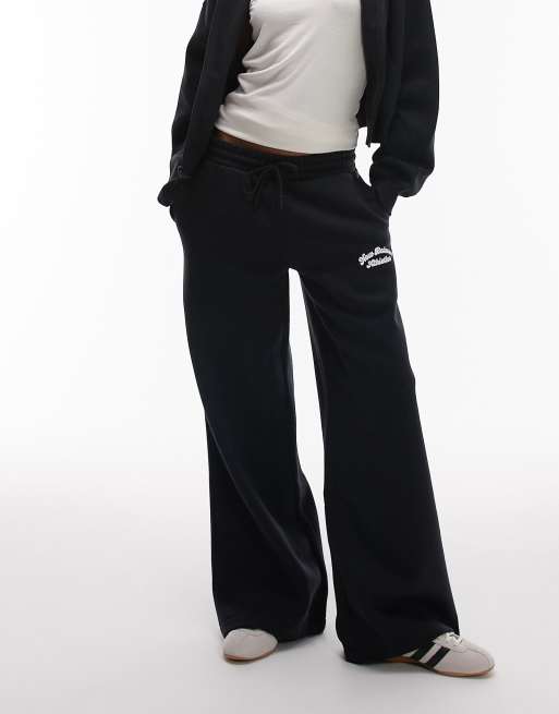 New Balance fleece wide leg trackies in black, 4 of 5