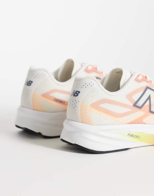 New Balance Flite-R dames hardloopsneakers in wit en oranje, 2 van 5