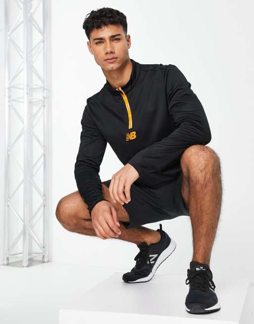 New Balance Football Graft Oberteil in Schwarz und Orange mit kurzem ReiBverschluss exklusiv bei ASOS