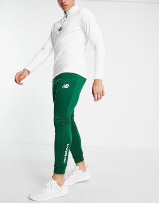 New Balance Football graft slim fit joggers in green - exclusive to ASOS