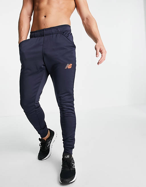 New Balance Football graft slim fit joggers in navy