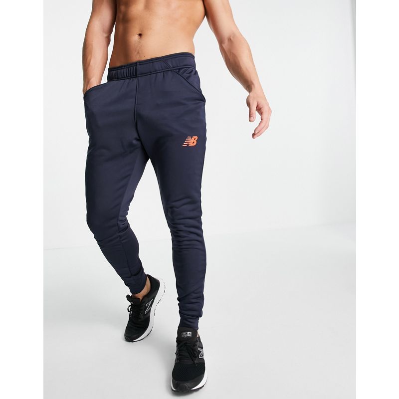Pantaloni e leggings Uomo New Balance - Football - Joggers slim blu navy