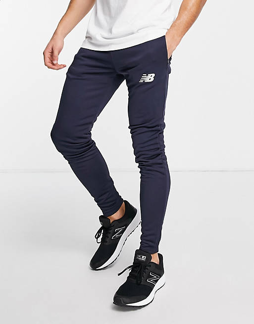 New Balance Football slim fit knitted joggers in navy