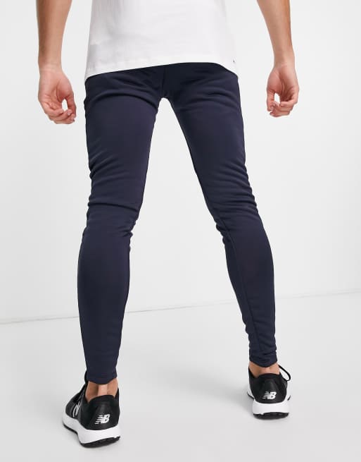 New balance store slim pant sn00