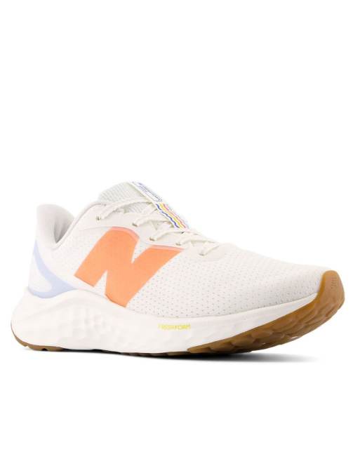 New Balance Fresh Foam Arishi v4 running trainers in white and orange ...