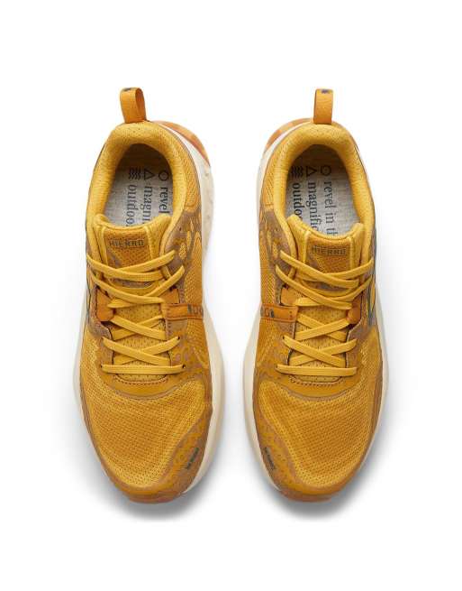 New balance fashion yellow trainers