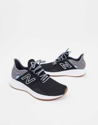 new balance running roav trainers in triple black
