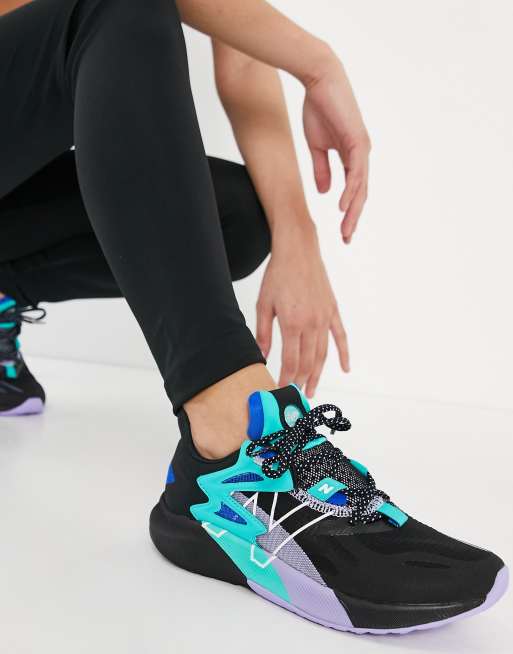 New Balance FuelCell Propel RMX sneakers in black and lilac | ASOS