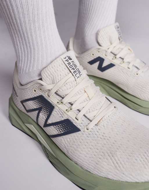 New Balance Fuelcell Propel running trainers in beige and green, 5 of 5