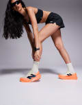 [New Balance] New Balance FuelCell Rebel v4 women's running trainers in orange 39 ORANGE