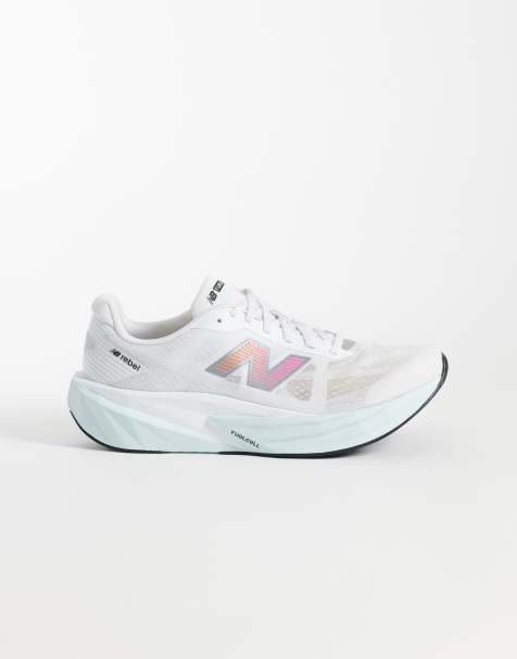 New Balance – Fuelcell Rebel V5 – Buty sportowe do biegania w kolorze białym, jasnoniebieskim i różowym - view 1