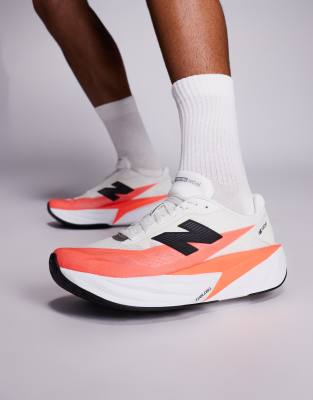 New Balance – Fuelcell Rebel V5 – Buty sportowe do biegania w kolorze jaskrawoczerwonym i białym
