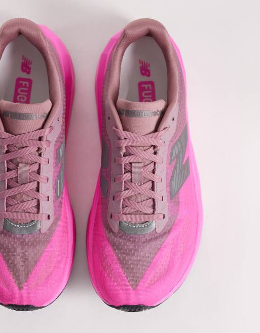 New Balance – FuelCell Rebel V5 – Lauf-Sneaker für Herren in Neonpink, 3 von 5