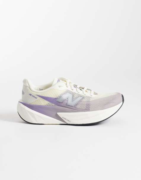 New Balance – FuelCell Rebel V5 – Lauf-Sneaker in Cremeweiß und Lila - view 1