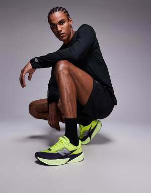 New Balance Fuelcell Rebel v5 mens running trainers in neon green and black