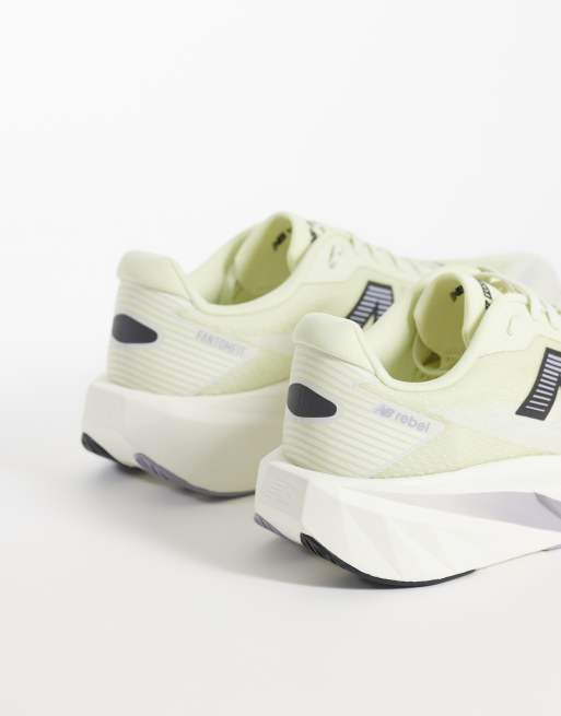 New Balance Fuelcell Rebel v5 mens running trainers in yellow, 2 of 5