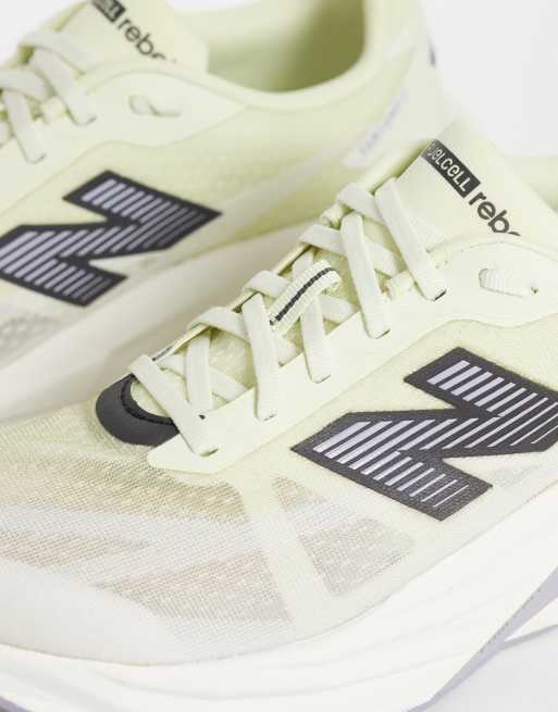 New Balance Fuelcell Rebel v5 mens running trainers in yellow, 4 of 5