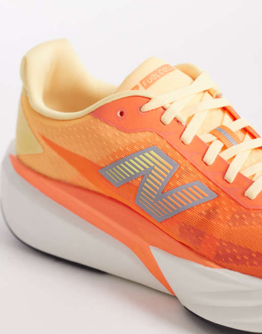 New Balance – Fuelcell Rebel v5 – Neonorange löparskor, 4 av 5