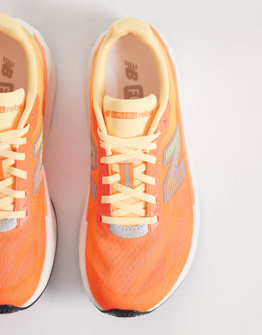New Balance – Fuelcell Rebel v5 – Neonorange löparskor, 3 av 5