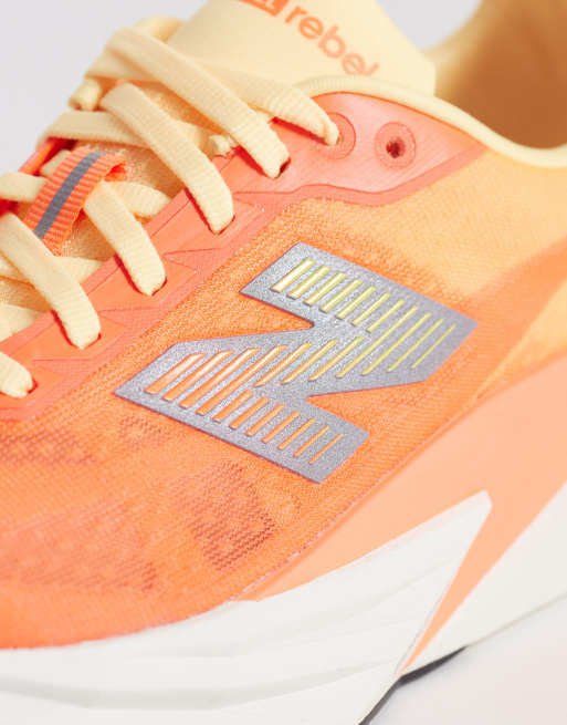 New Balance – Fuelcell Rebel v5 – Neonorange löparskor, 4 av 5