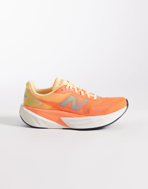 New Balance – Fuelcell Rebel V5 – Neonowopomarańczowe buty sportowe do biegania - view 1