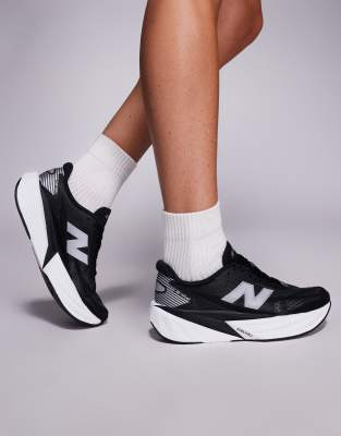 New Balance Fuelcell Rebel v5 running trainers in black-Yellow