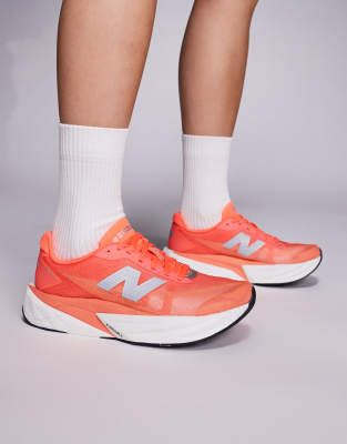New Balance Fuelcell Rebel v5 running trainers in bright red