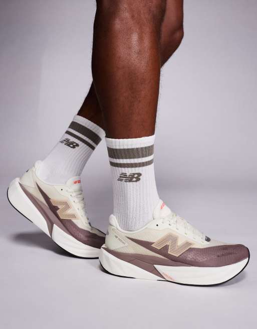 New Balance Fuelcell Rebel v5 running trainers in brown and beige