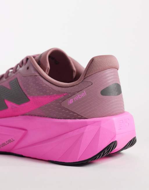 New Balance - Fuelcell Rebel v5 - Sneakers da corsa da donna rosa fluo, 3 di 5