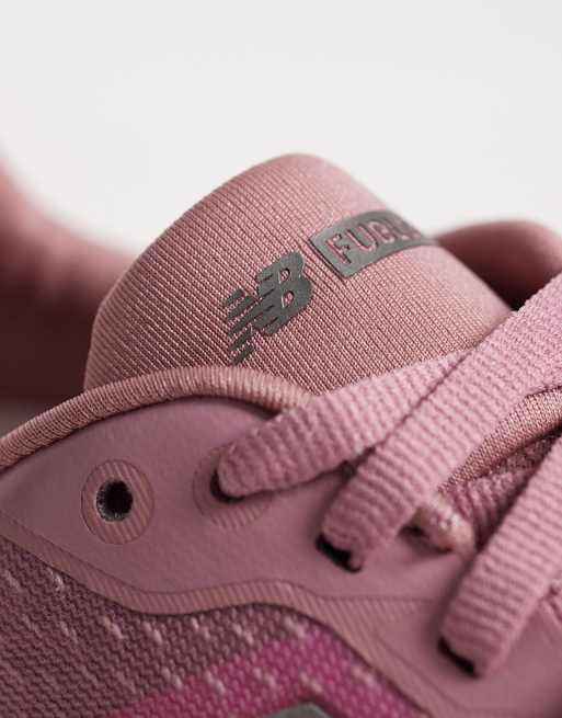 New Balance - Fuelcell Rebel v5 - Sneakers da corsa da donna rosa fluo, 4 di 5