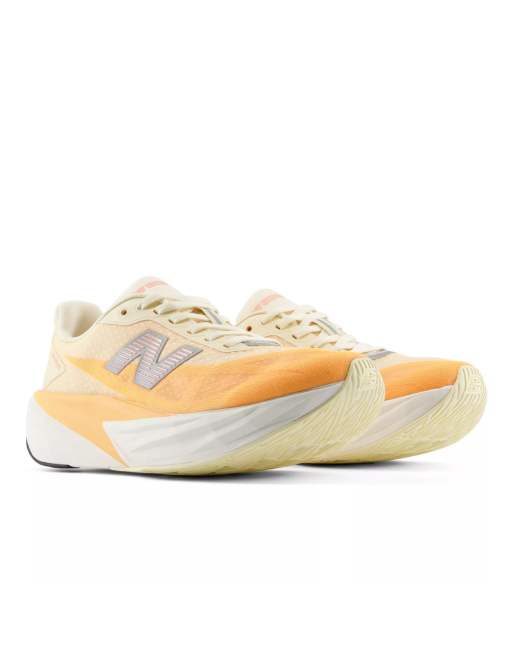 New Balance Fuelcell rebel v5 trainers in calcium, 2 of 4