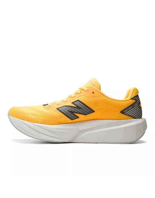 New Balance Fuelcell rebel v5 trainers in satsuma orange, 3 of 7