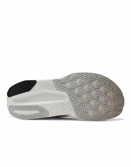 New Balance Fuelcell rebel v5 trainers in satsuma orange, 6 of 7