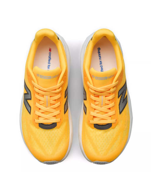 New Balance Fuelcell rebel v5 trainers in satsuma orange, 4 of 7