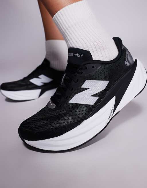 New Balance Fuelcell Rebel v5 womens running trainers in black, 4 of 5