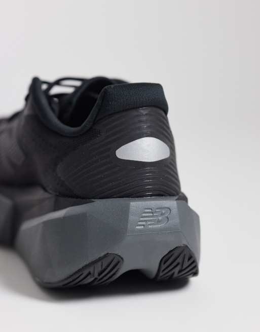 New Balance Fuelcell Rebel v5 womens running trainers in black, 4 of 5