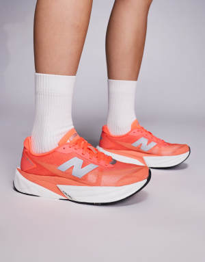 New Balance Fuelcell Rebel v5 womens running trainers in bright red