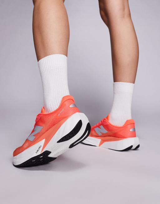 New Balance Fuelcell Rebel v5 womens running trainers in bright red, 4 of 5