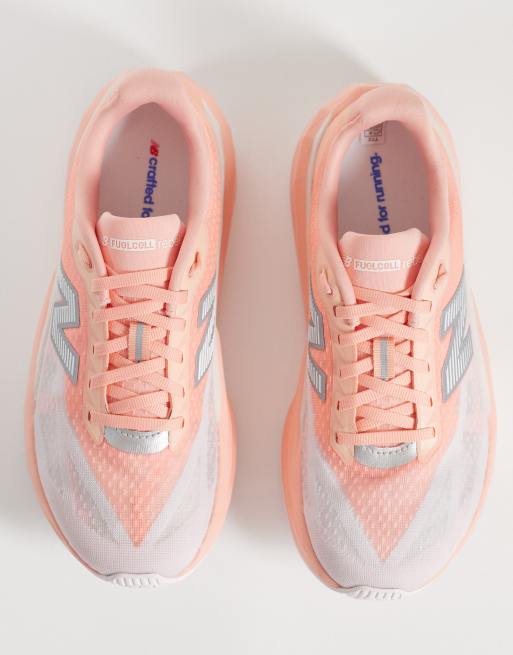 New Balance Fuelcell Rebel v5 womens running trainers in peach, 3 of 5