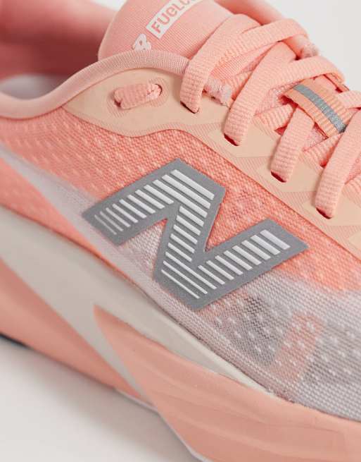 New Balance Fuelcell Rebel v5 womens running trainers in peach, 4 of 5