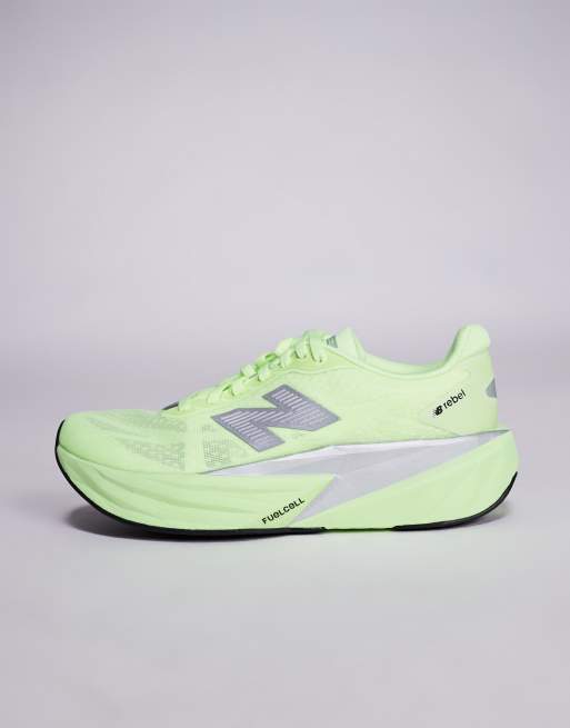 New Balance Fuelcell Rebel v5 womens running trainers in volt yellow, 2 of 5