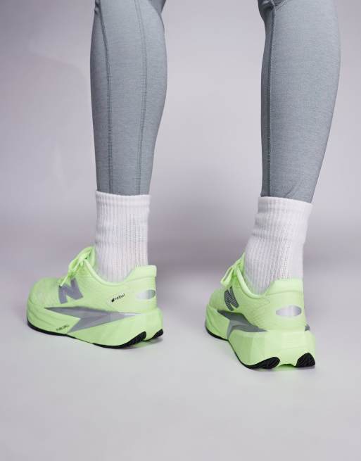 New Balance Fuelcell Rebel v5 womens running trainers in volt yellow, 4 of 5