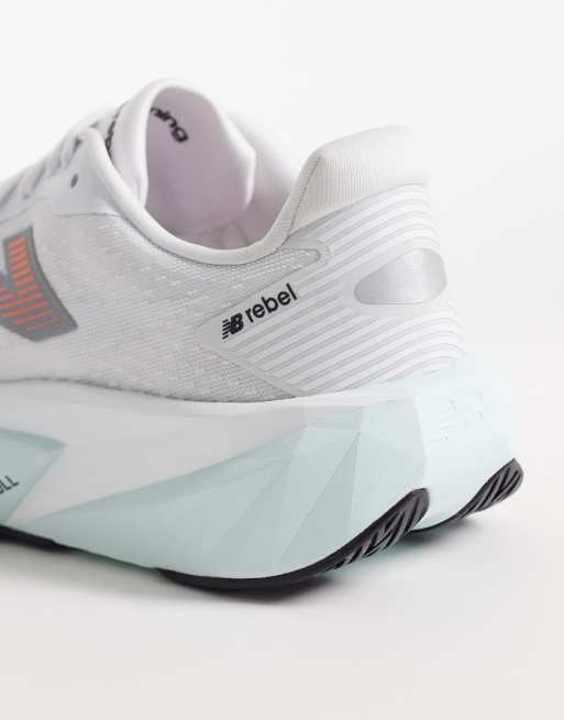 New Balance Fuelcell Rebel v5 womens running trainers in white, light blue and pink, 3 of 5