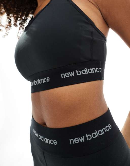 New Balance Gladde sport bh met logo en medium ondersteuning in zwart