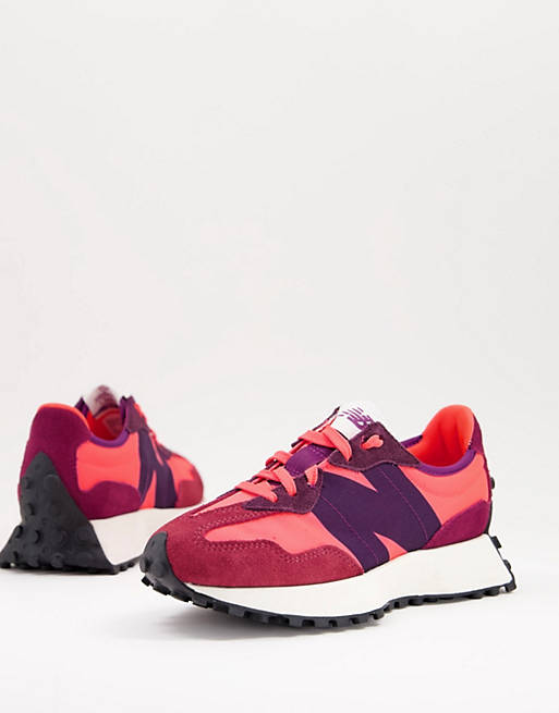 New Balance 327 trainers in pink and red
