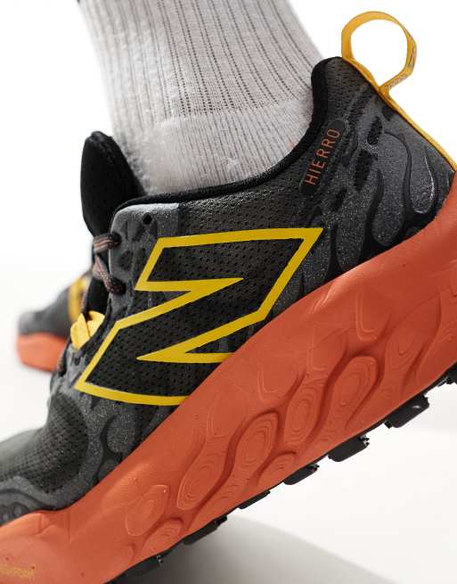 New Balance Hierro trail running trainers in black and orange, 4 of 5